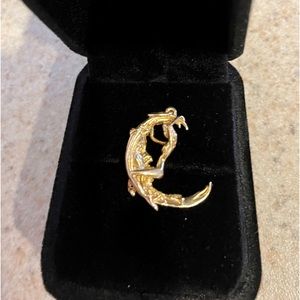 Custom made 14k gold half moon with women figure on moon.